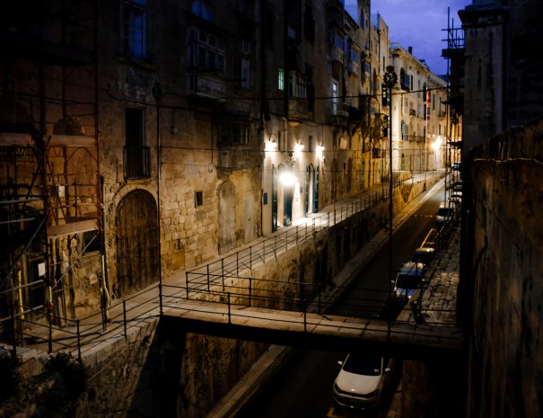 A dark road at night in Valletta