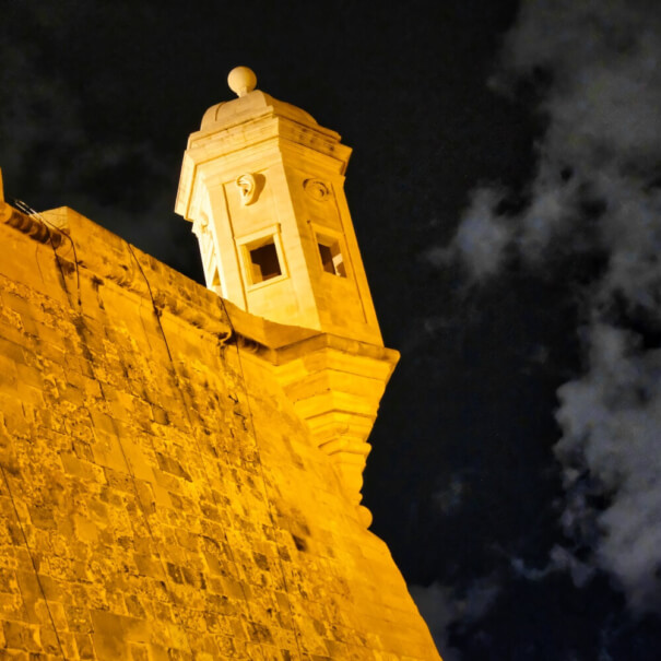 The Senglea Guardiola at night
