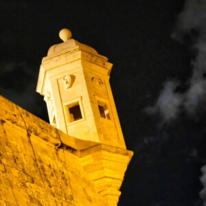 The Senglea Guardiola at night