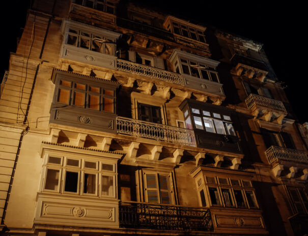 Old Maltese closed balconies seen at night