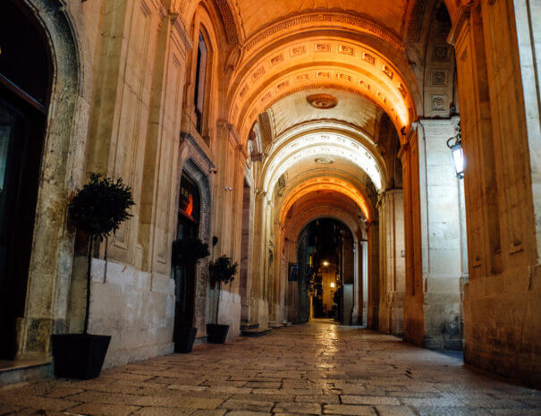 An old passageway with high arches in Valletta